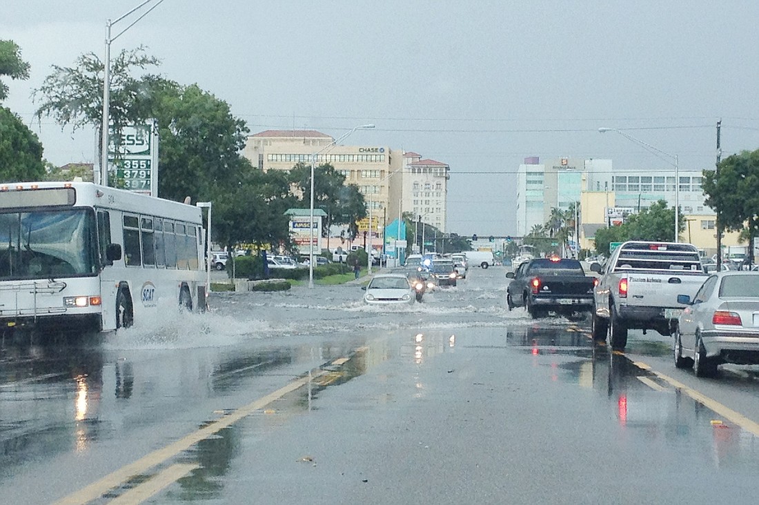 Flooding occurred after a short rainstorm Wednesday, Aug. 28, on U.S. 301, just north of Fruitville Road. Photo by Leslie Gnaegy.