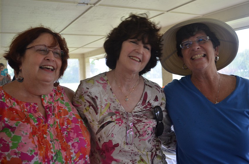 Julie Friedman, Susan Garbett and Felicia Servetz sing traditional Jewish songs during the celebration.