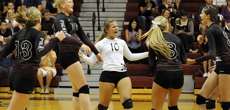 The Braden River High volleyball team celebrates a point during its 3-2 victory over rival Lakewood Ranch Sept. 10.