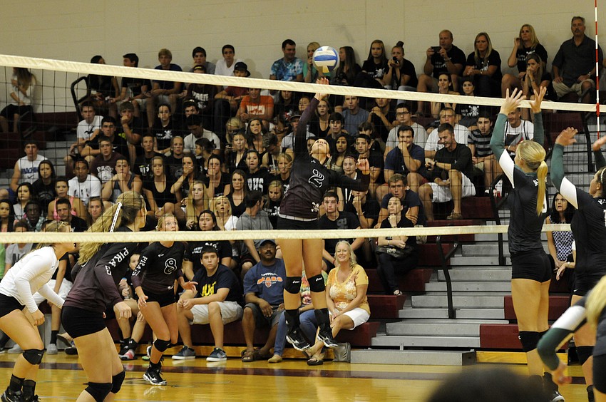 Junior outside hitter Siena Kelley goes up for a kill in Game 1.
