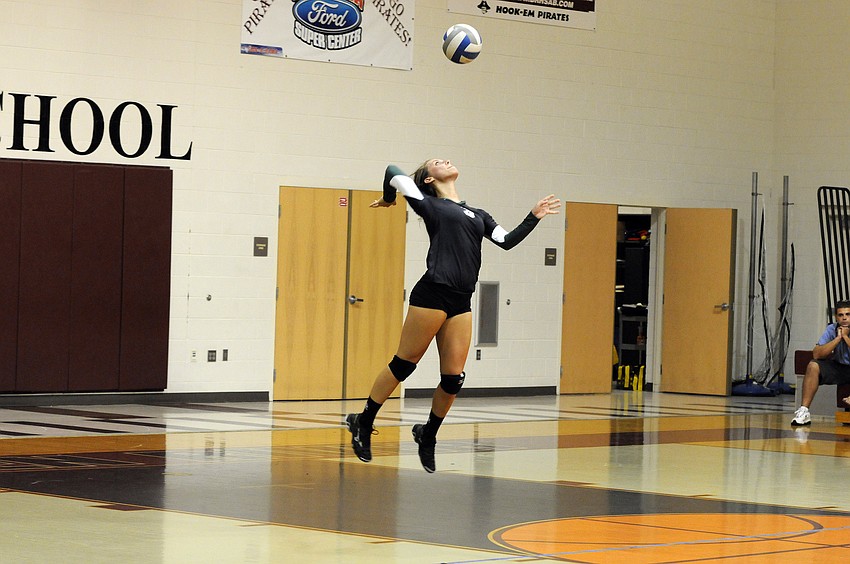 Lakewood Ranch senior Lauren Owens serves the ball.