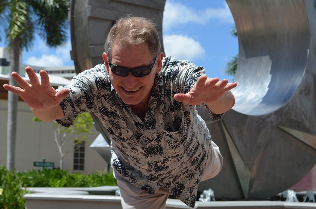 Science fiction author Marty Fugate thinks this cosmic statue in Selby Five Points Park looks like a portal to another dimension Ã¢â‚¬â€Ã‚Â ideally, he would have positioned himself in the center of it.