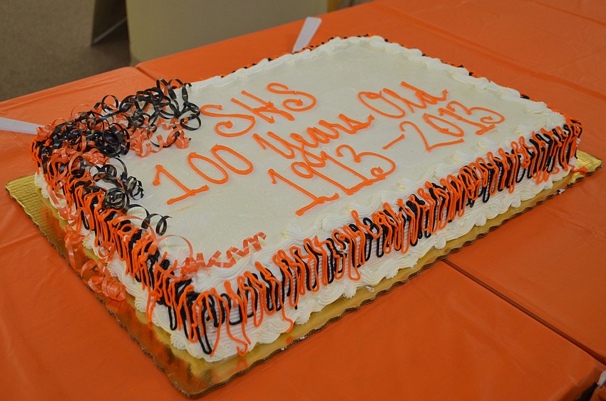 Faculty and staff gathered Monday, Sept. 16, in the Media Center at Sarasota High School to celebrate the schoolâ€™s 100th anniversary.
