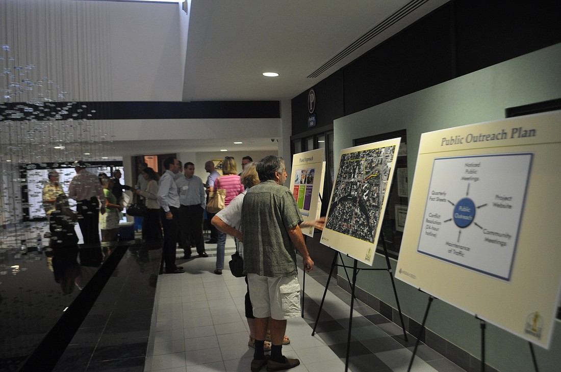 Prior to Thursday's community meeting regarding the construction of Lift Station 87, the lobby at City Hall was set up for attendees to peruse informational posters the new project team made.