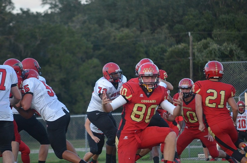 Matt Hueston gets up off the ground as the play comes to an end.