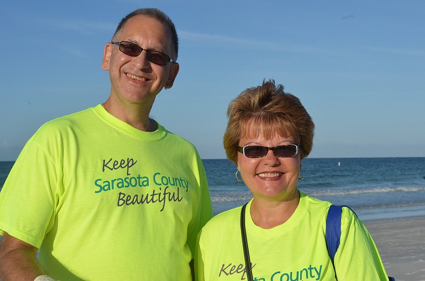 Jim Eckman and Vivian Tamez moved to Sarasota from Bloomington, IL one month ago. They enjoy their morning keeping their new community clean.