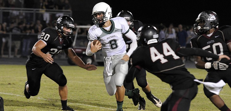 Lakewood Ranch quarterback Chad Rex rushed for 98 yards and two touchdowns to lead the Mustangs to a 42-31 victory over rival Braden River Sept. 20.