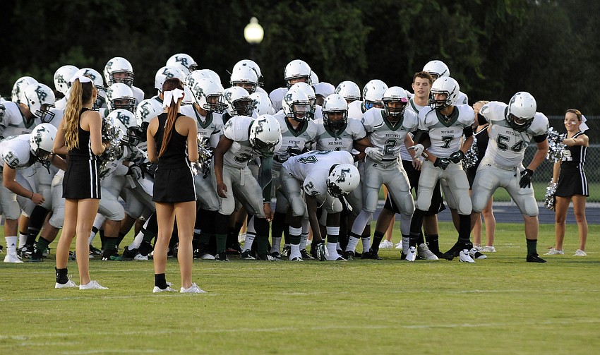 The Lakewood Ranch High football team prepares to take the field for its district rivalry game against Braden River Sept. 20.