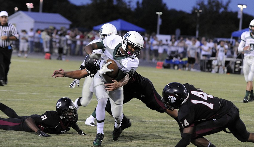 Lakwood Ranch wide receiver Cameron Pearcey hauls in a pass in the first half.