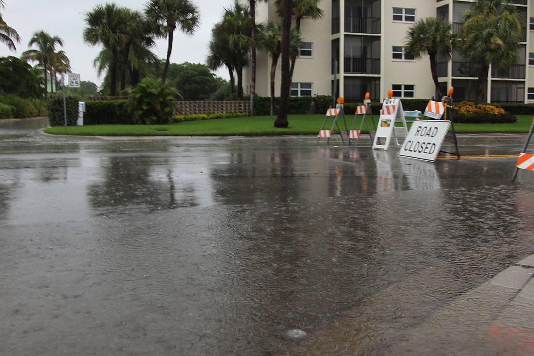 Sarasota County has closed a flooded stretch of Beach Road from the intersection with Beach Way to Midnight Pass Road.