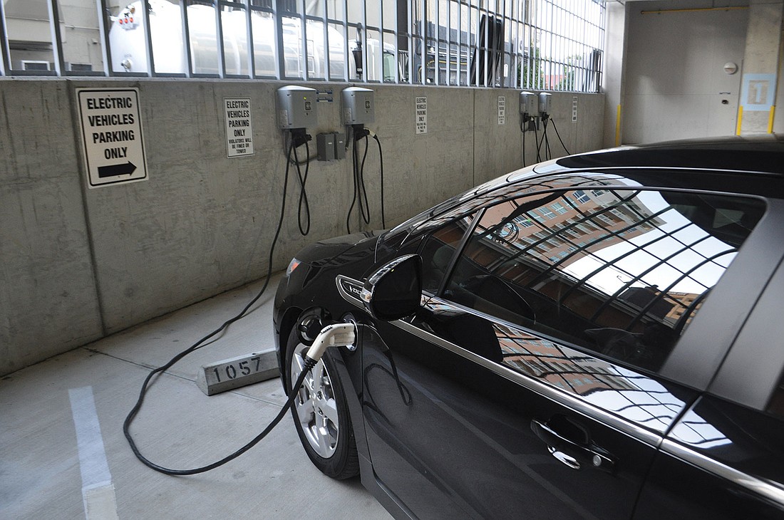 Chris Sharek's Chevrolet Volt charges for free at the Palm Avenue parking garage.