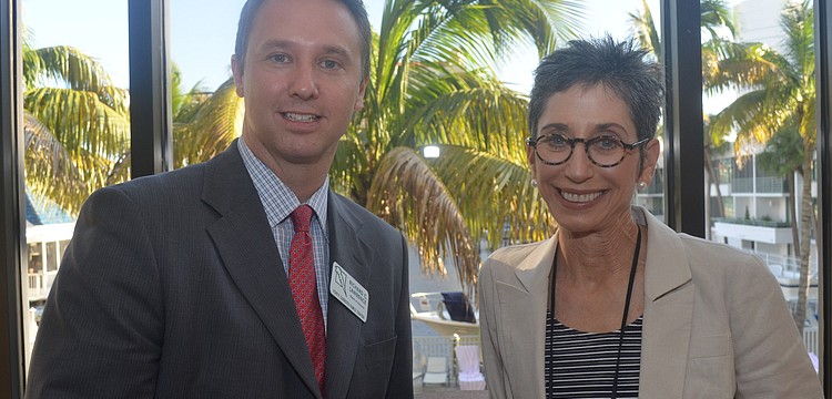 Richard Lawrence of the board of directors with guest speaker Betsy Brown Braun