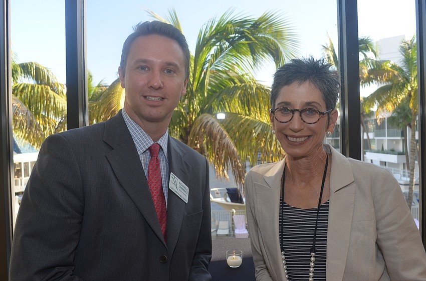 Richard Lawrence of the board of directors with guest speaker Betsy Brown Braun