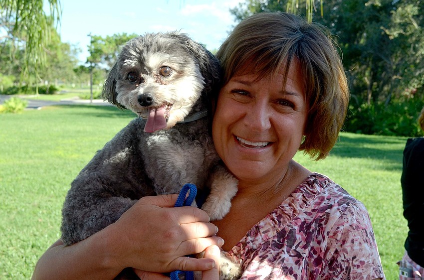 Sue Dinger and her dog, Kai