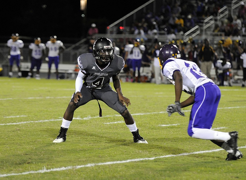 Braden River cornerback Ahmad Dunbar lines up against Bookerâ€™s Spencer Cater.