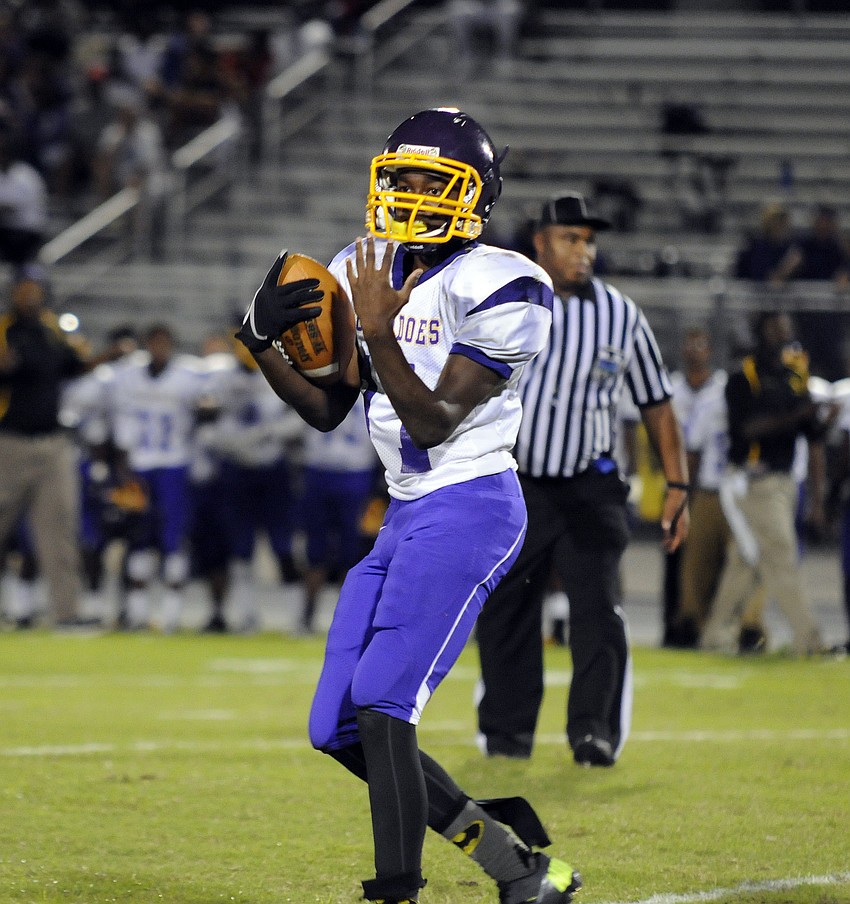 Booker wide receiver Artie Henry signals a catch in the second half.