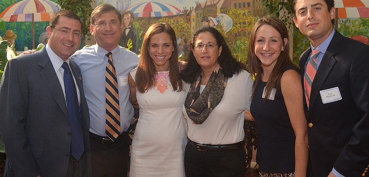 Benderson Development received the Corporate Citizen Award. Shaun, Randy, Gina and Lori Benderson with Rachel Berkun and Evan Benderson