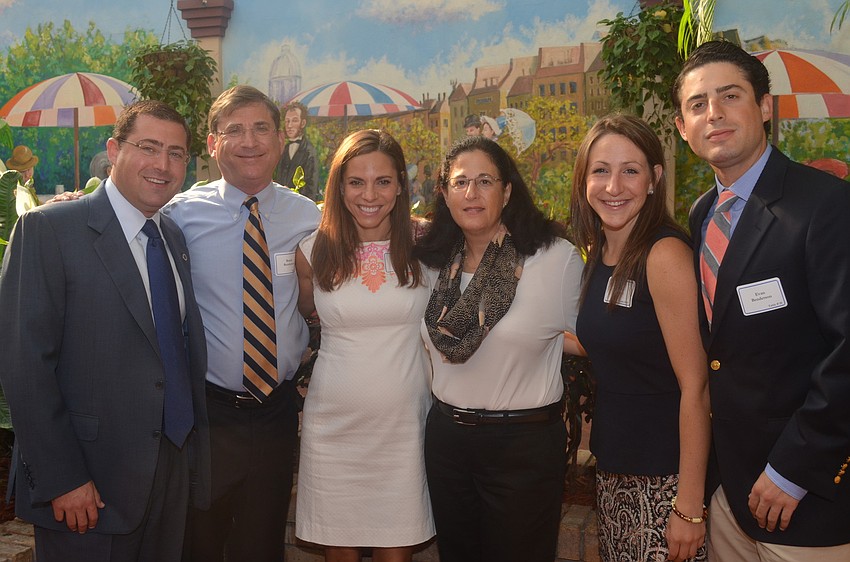 Benderson Development received the Corporate Citizen Award. Shaun, Randy, Gina and Lori Benderson with Rachel Berkun and Evan Benderson