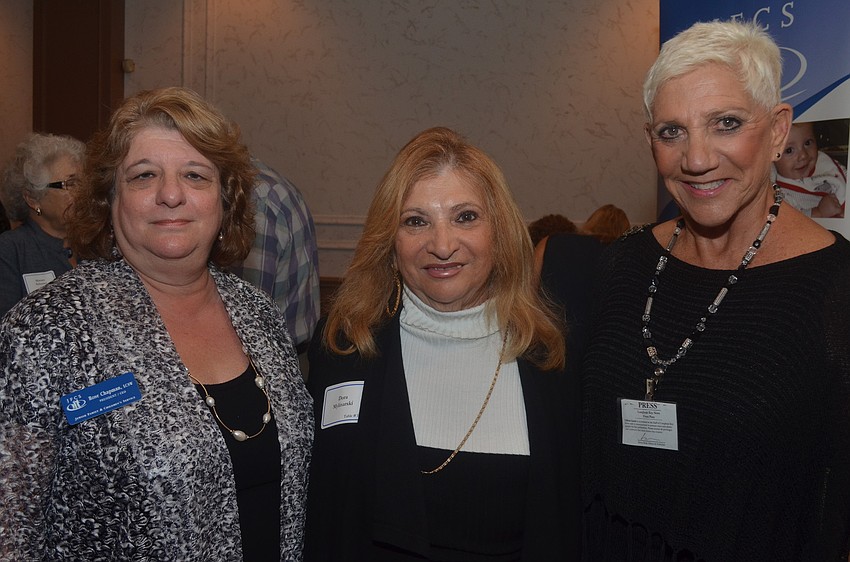 Rose Chapman was recognized for her 20 years of work with JFCS. She chats with Dora Mylinarski and Lillian Sands.