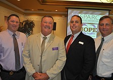 Det. Chad McDonald, Lt. Joe Hayes, Det. Eric Wedin and Lt. Tom Stroud got up early for the breakfast