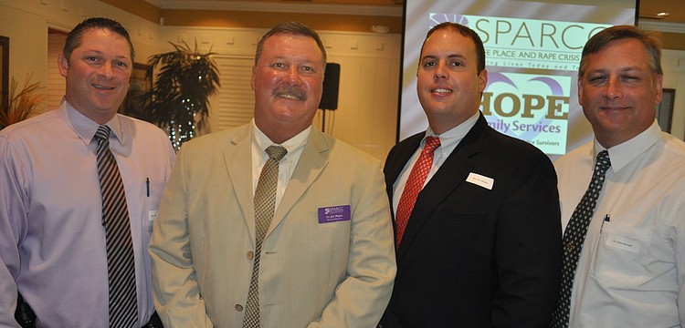 Det. Chad McDonald, Lt. Joe Hayes, Det. Eric Wedin and Lt. Tom Stroud got up early for the breakfast
