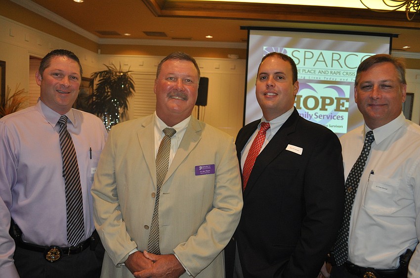 Det. Chad McDonald, Lt. Joe Hayes, Det. Eric Wedin and Lt. Tom Stroud got up early for the breakfast