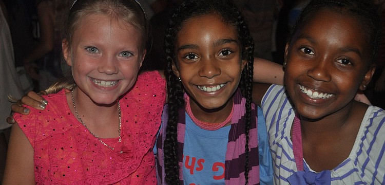 Sage Arnish, Ashley Janeck and Ta'nya Bell took time out from dancing for a photo