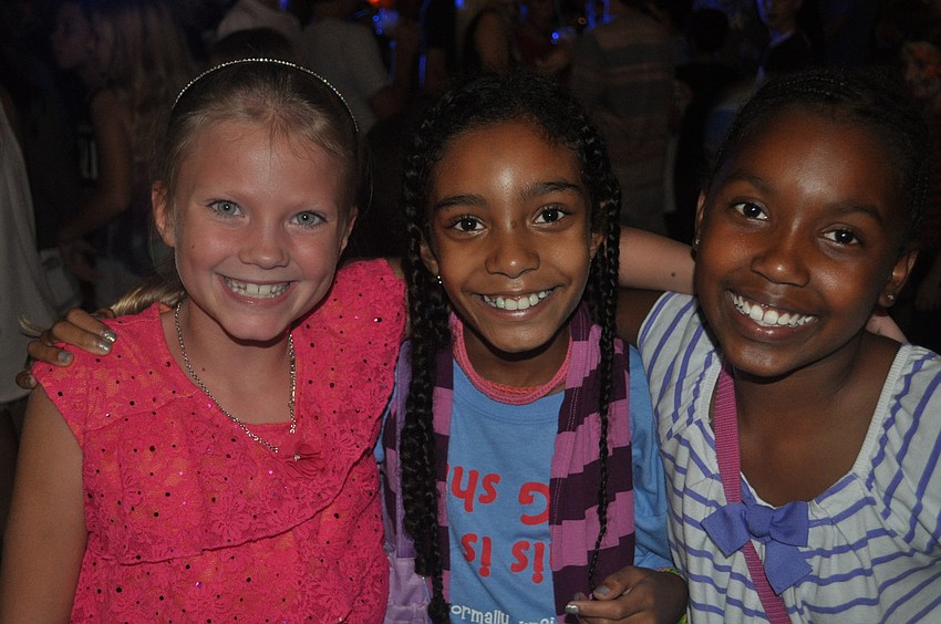 Sage Arnish, Ashley Janeck and Ta'nya Bell took time out from dancing for a photo