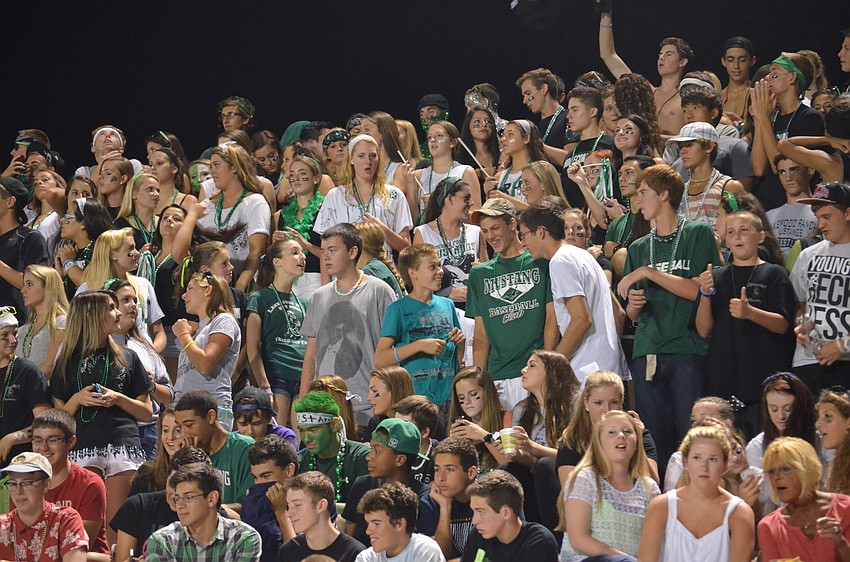 Students showed school spirit by cheering on their winning team.