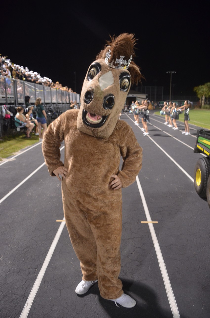 Mascot Kylee Risdon puts smiles on fans faces as she performs silly stunts.
