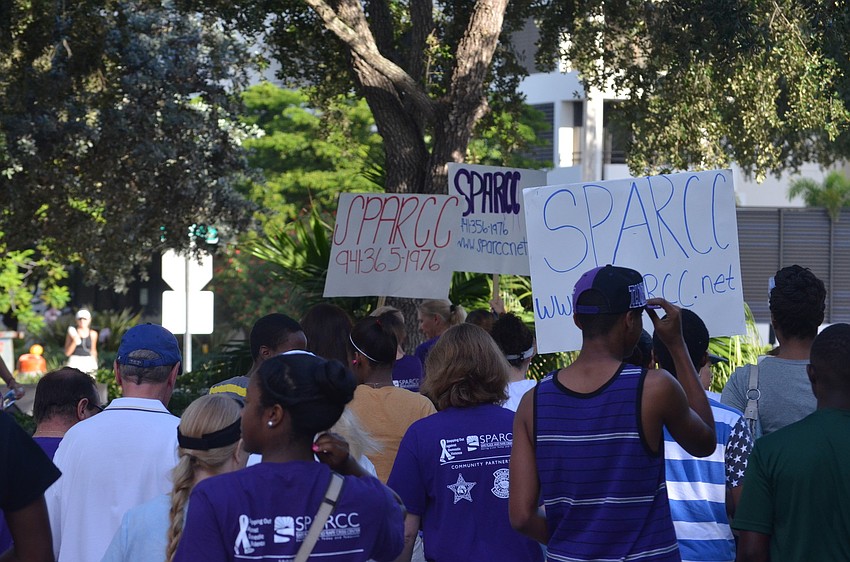 Walkers show their support for victims of domestic abuse and step out against violence.