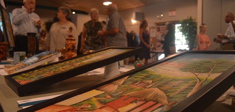 Parishioners participated in a silent auction for Haitian artisan made crafts.