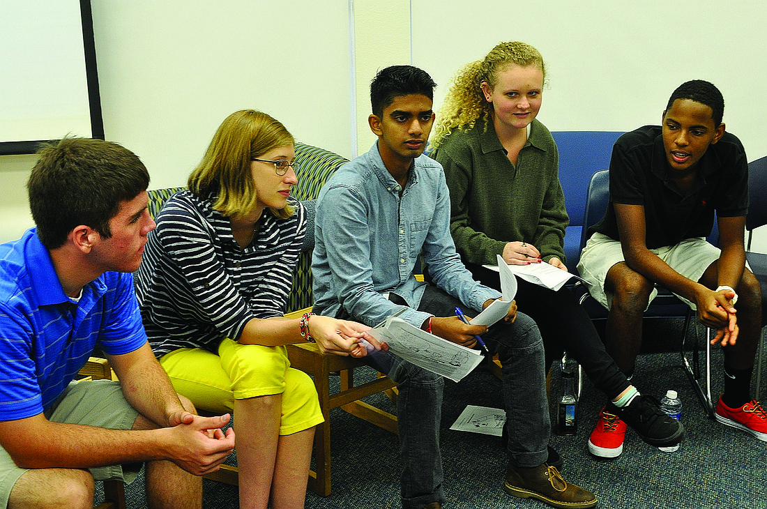 ODA and Booker students, including Janum Trivedi, center, learned that posture often determined how diplomatic counterparts perceive one another.
