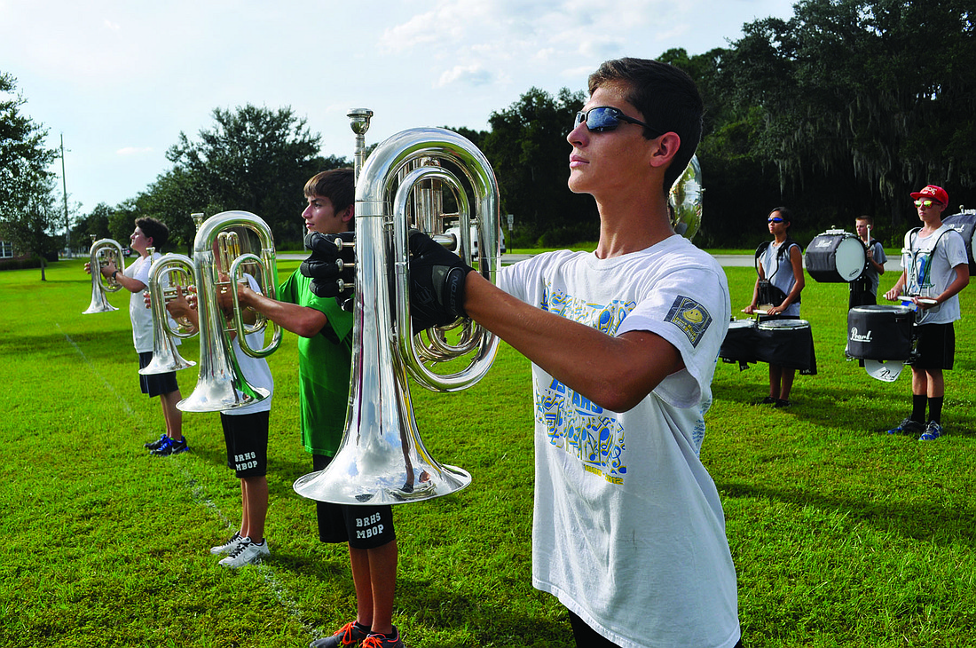 Jason Lugo took orders from Braden River Marching Band staff during a Oct. 3 practice.