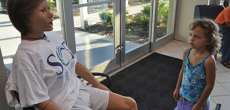 Sophia Albrecht, 6, encountered a patient simulator. In SCFâ€™s simulation center, aspiring nurses and physicians train on these computerized mannequins.