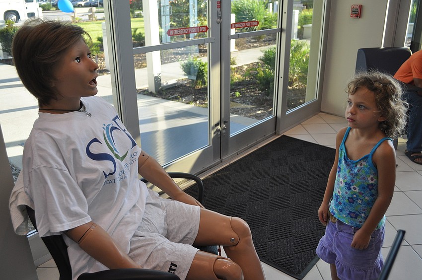 Sophia Albrecht, 6, encountered a patient simulator. In SCFâ€™s simulation center, aspiring nurses and physicians train on these computerized mannequins.