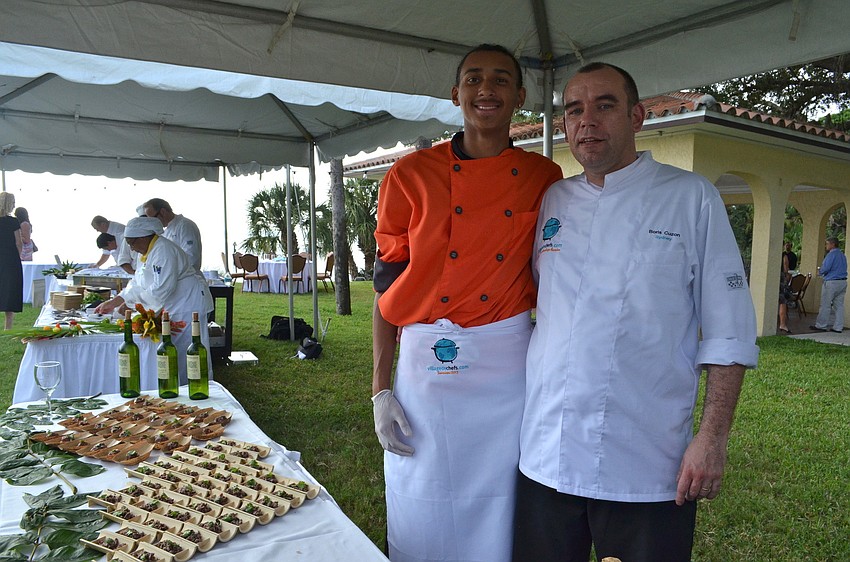 Chef Boris Cuzon with high-school student Aarien Foster