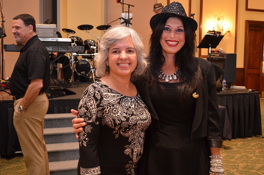 Chairwoman Marie Avery with Sheri Nadelman, the lead singer of soulRcoaster.