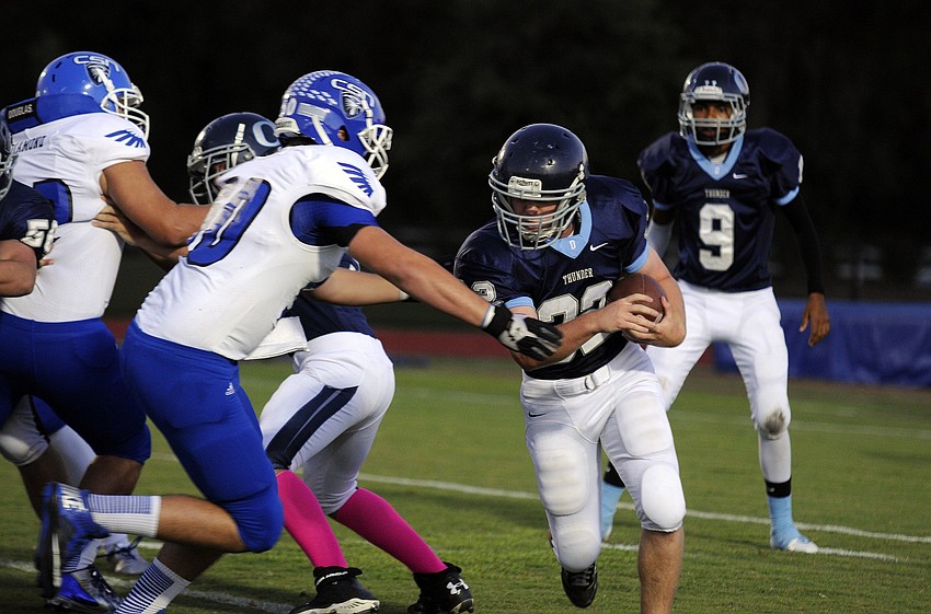 ODA sophomore running back Chris Poole carries the ball on the Thunderâ€™s opening possession.