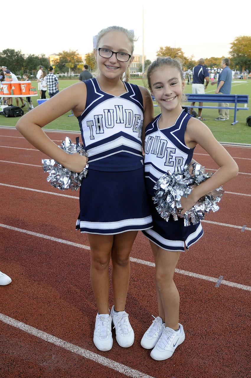 Seventh-graders Celia Miller and Sydney Hill couldnâ€™t wait to cheer on the Thunder.