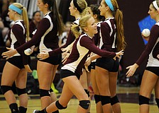 Riverview sophomore Mikaela Braune receives high fives from her teammates before the start of the Lady Rams non-district match versus ODA Oct. 14.