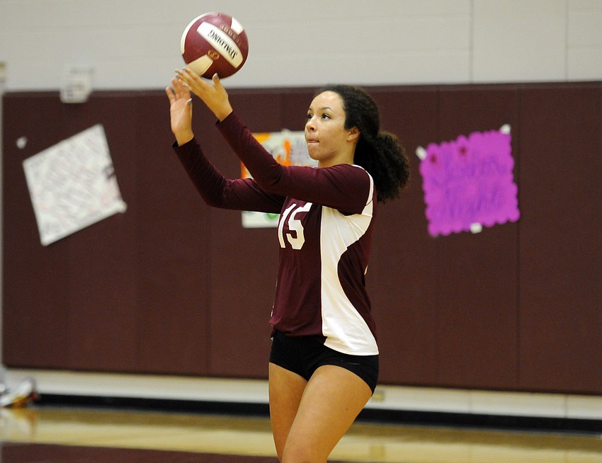 Riverview middle blocker Natasha Samuel prepares to serve the ball during the first set.