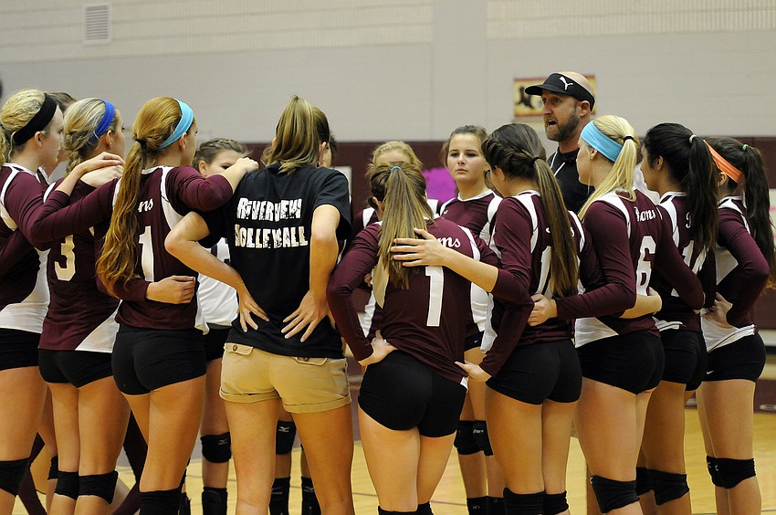 Riverview coach Joe Rohr energizes his team during a timeout.