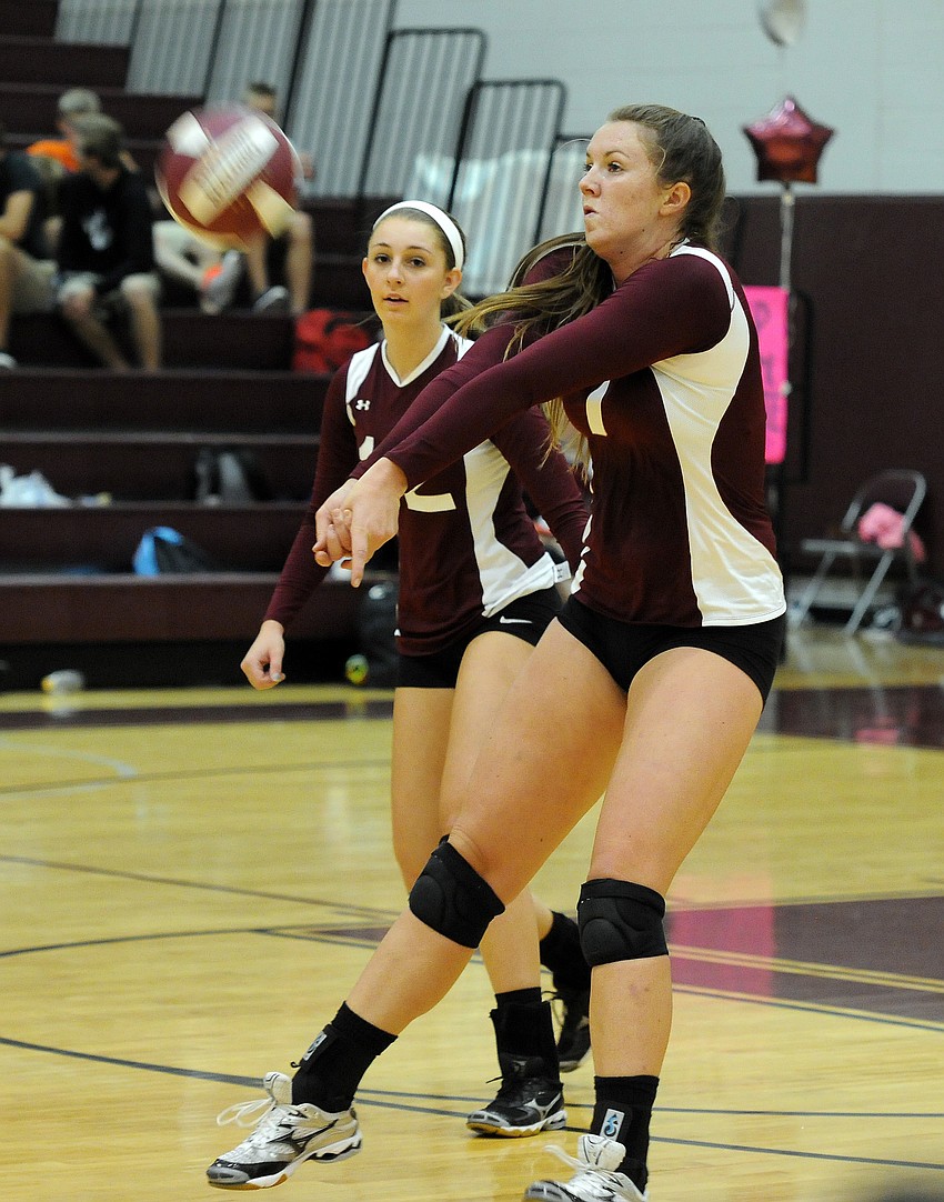 Riverview senior Carley Scrabrough passes the ball back to a teammate in the first set.