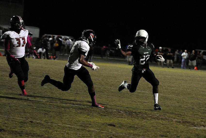 Lakewood Ranch sophomore Brandon Luckett carries the ball for a 7-yard gain.
