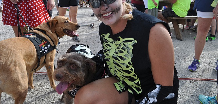Jessica Hanson and Bailey dressed up as skeletons