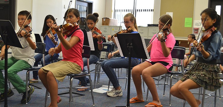 Students ages 10 to 13 have a breakout session with a Sarasota private teacher Cynthia Wiley.