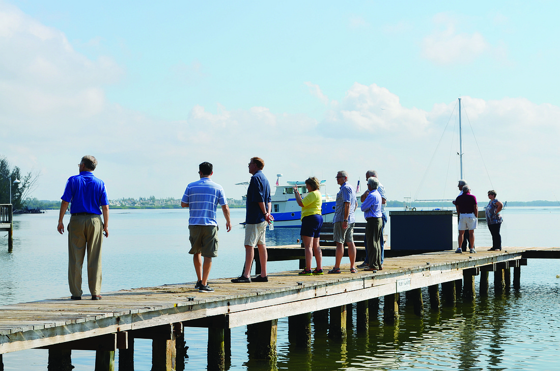Urban Land Institute panelists stretch their legs for a view of Sarasota Bay in Longbeach Village.