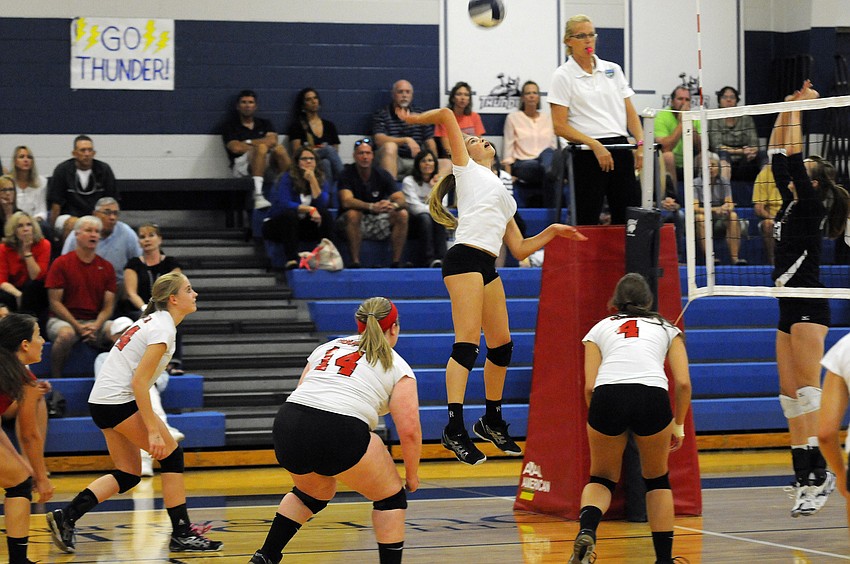Cardinal Mooney freshman Madison McNally goes up for a kill during the Cougars district semifinal match versus Bradenton Christian.