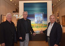 Developer Michael Adams, architect Guy Peterson and developer Jonathan McCague present the new luxury condominiums.